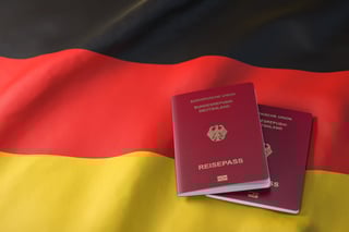 German passports placed on the German flag