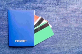 Passport With Credit Cards On Denim