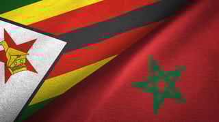 Zimbabwe And Morocco Flags Together