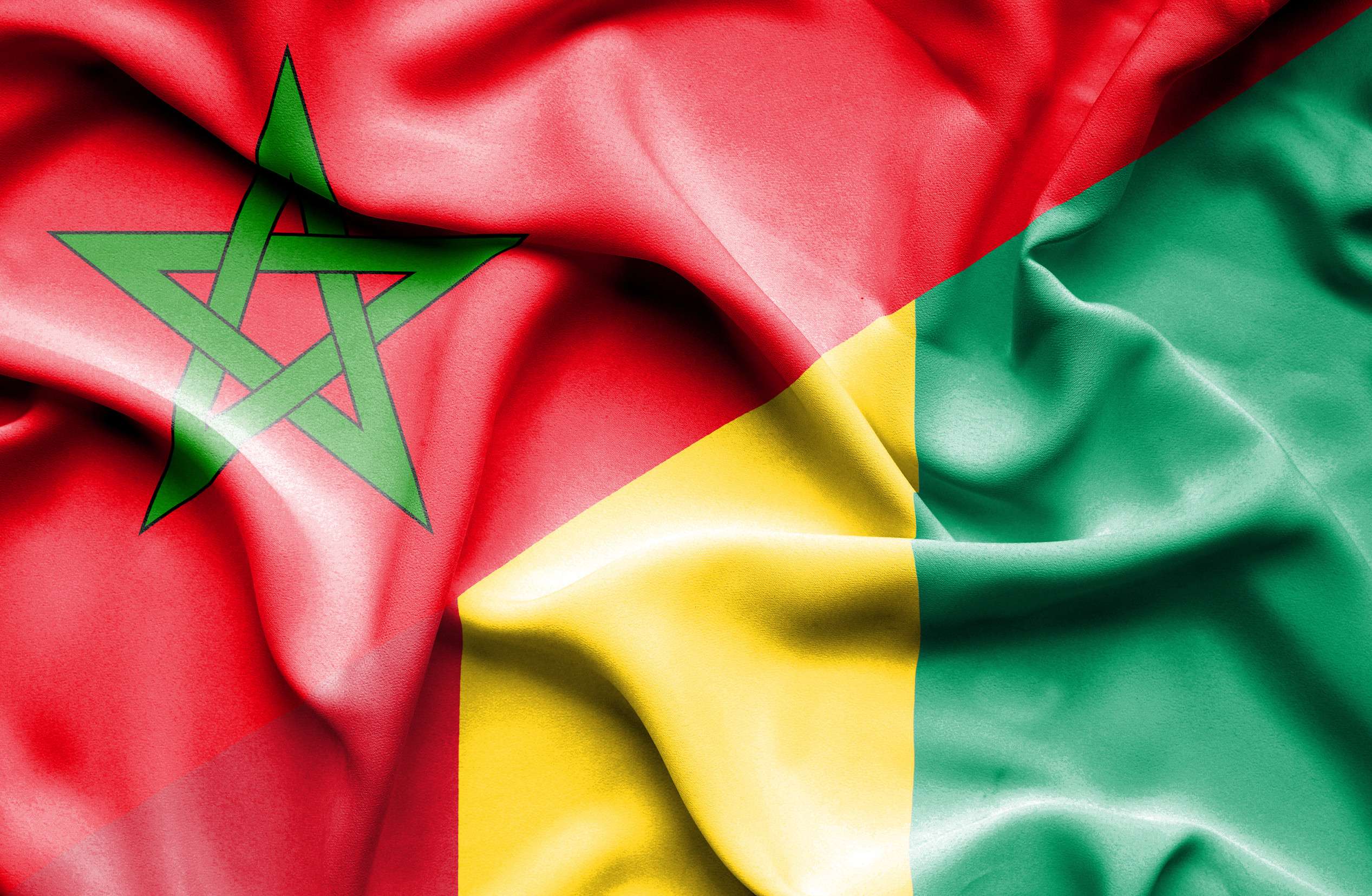 Morocco And Guinea Bissau Flags Together